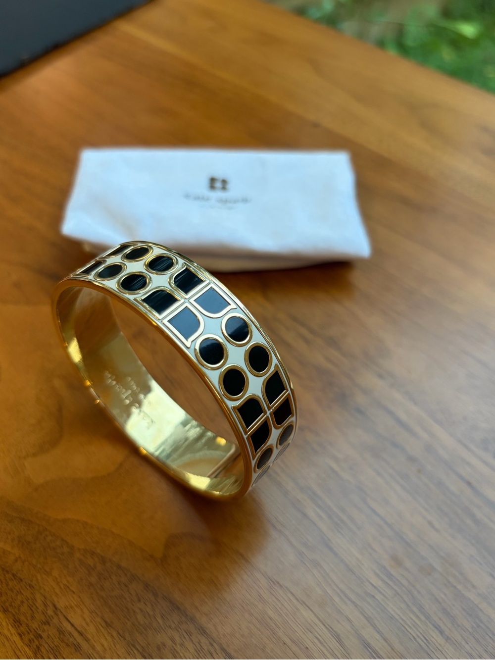 Kate Spade New York Have Courage Enamel Bangle Bracelet Cream Black Gold Pouch